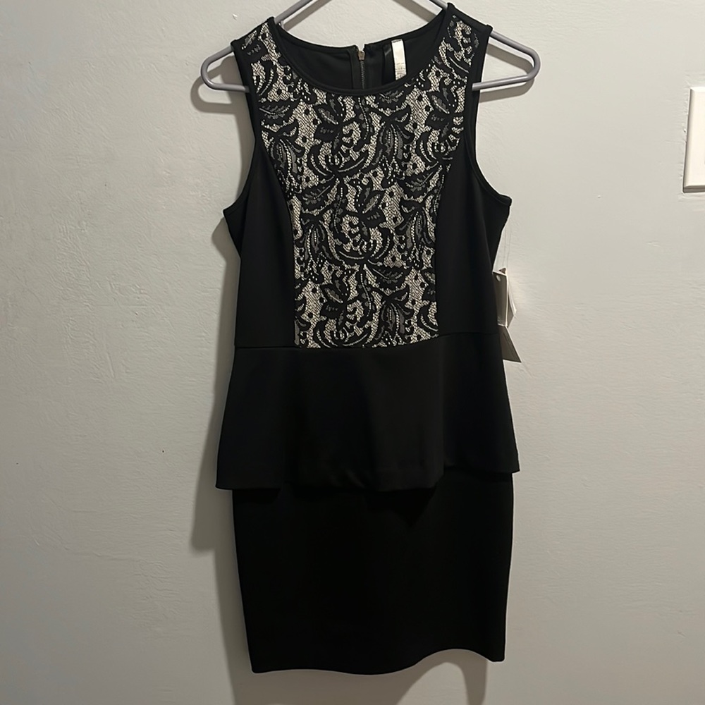 A black, lace material, size small dress from kensie.